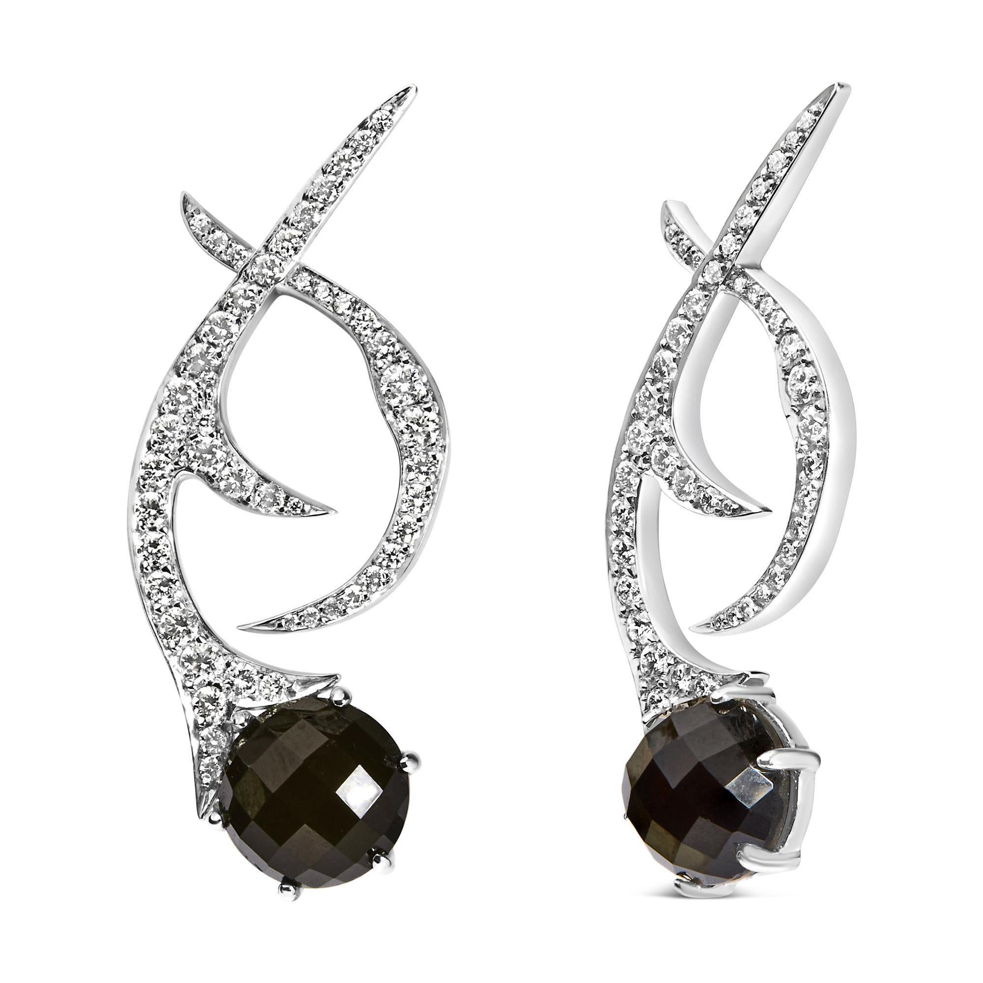 Introducing a fusion of elegance and drama, these exquisite 18K white gold swirl drop earrings sparkle with an opulent array of natural, untreated diamonds, boasting 1 3/5 cttw. Each piece radiates with a F-G color and VS1-VS2 clarity, manifesting a
