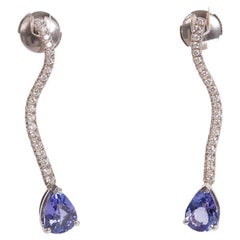 18k White Gold Earrings Set with Two Pears Tanzanites and Diamonds