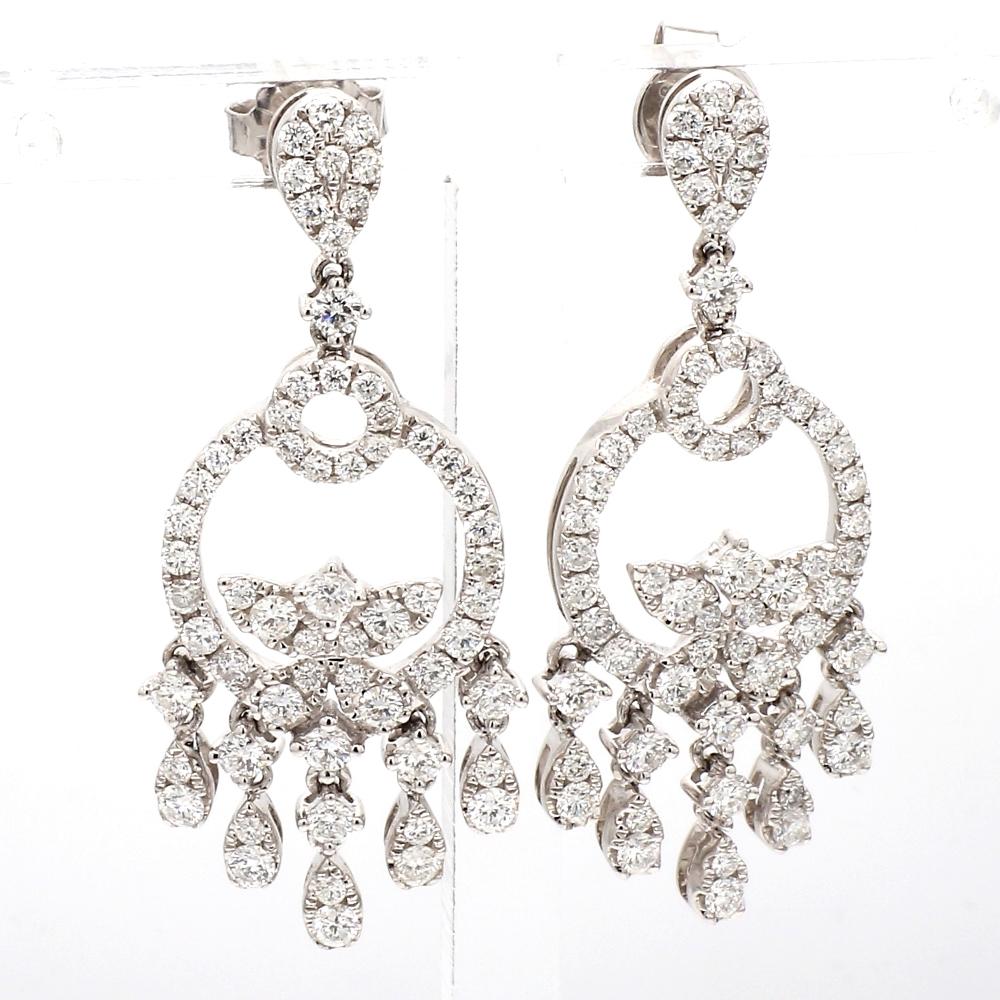 18K White Gold Earrings with 2.10ctw Round Diamonds

These exquisite 18K white gold earrings feature a total of 2.10 carats of round brilliant cut diamonds, with 124 stones offering incredible sparkle and elegance. Weighing approximately 8.5 grams,