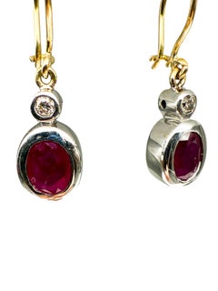 Boucles d'oreilles en or blanc 18K avec rubis
