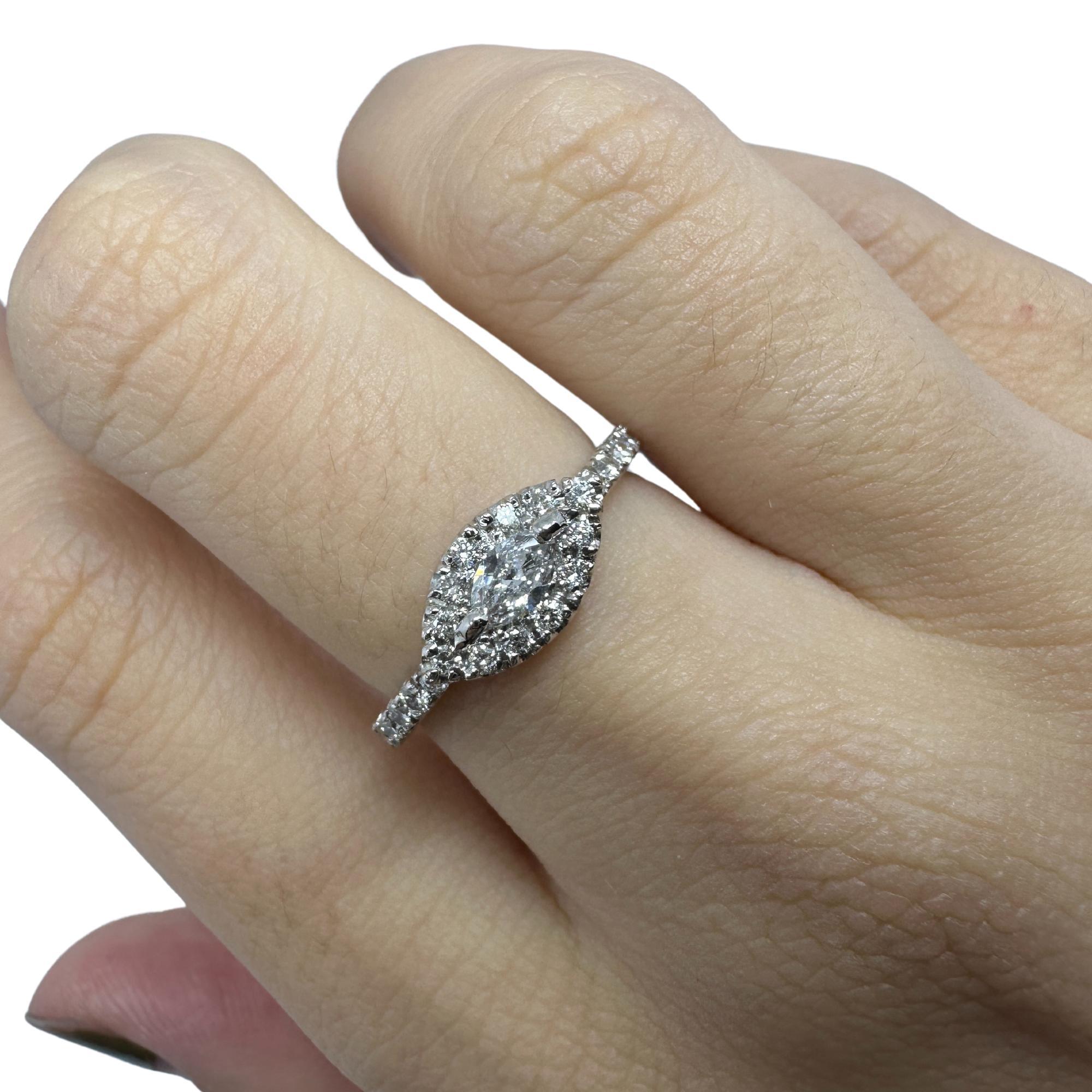 18k White Gold East-West Marquise Cut Diamond Ring
Condition: In good condition with some minor surface wear consistent with age.
Ring size: 6.75
Markings: 