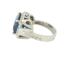 18K White Gold East/West Set Tanzanite & Round Brilliant Cut Diamond Halo Ring