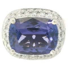 18K White Gold East/West Set Tanzanite & Round Brilliant Cut Diamond Halo Ring