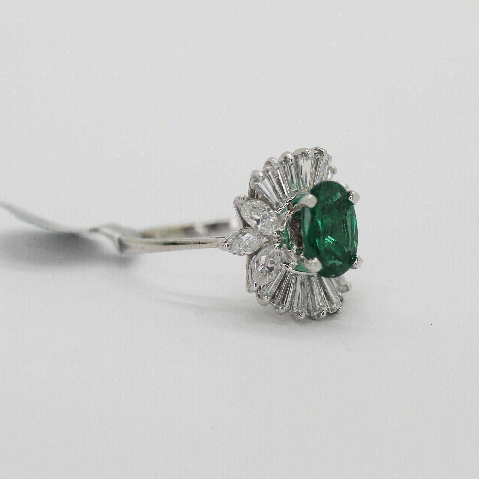 Specifications: 

    CENTER STONE:GREEN EMERALD - OVAL - 1.31CT
    DIAMONDs:  F VS2-
    APPROXIMATELY 1.15 CTW 
    metal:18K WHITE GOLD
    type:RING
    weight:5.26 GrS
    RING size:7.5
    hallmark:18K

