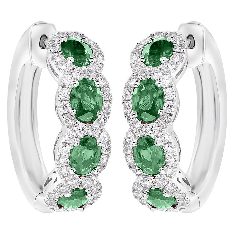 Orecchini con smeraldo e diamante in oro bianco 18 carati