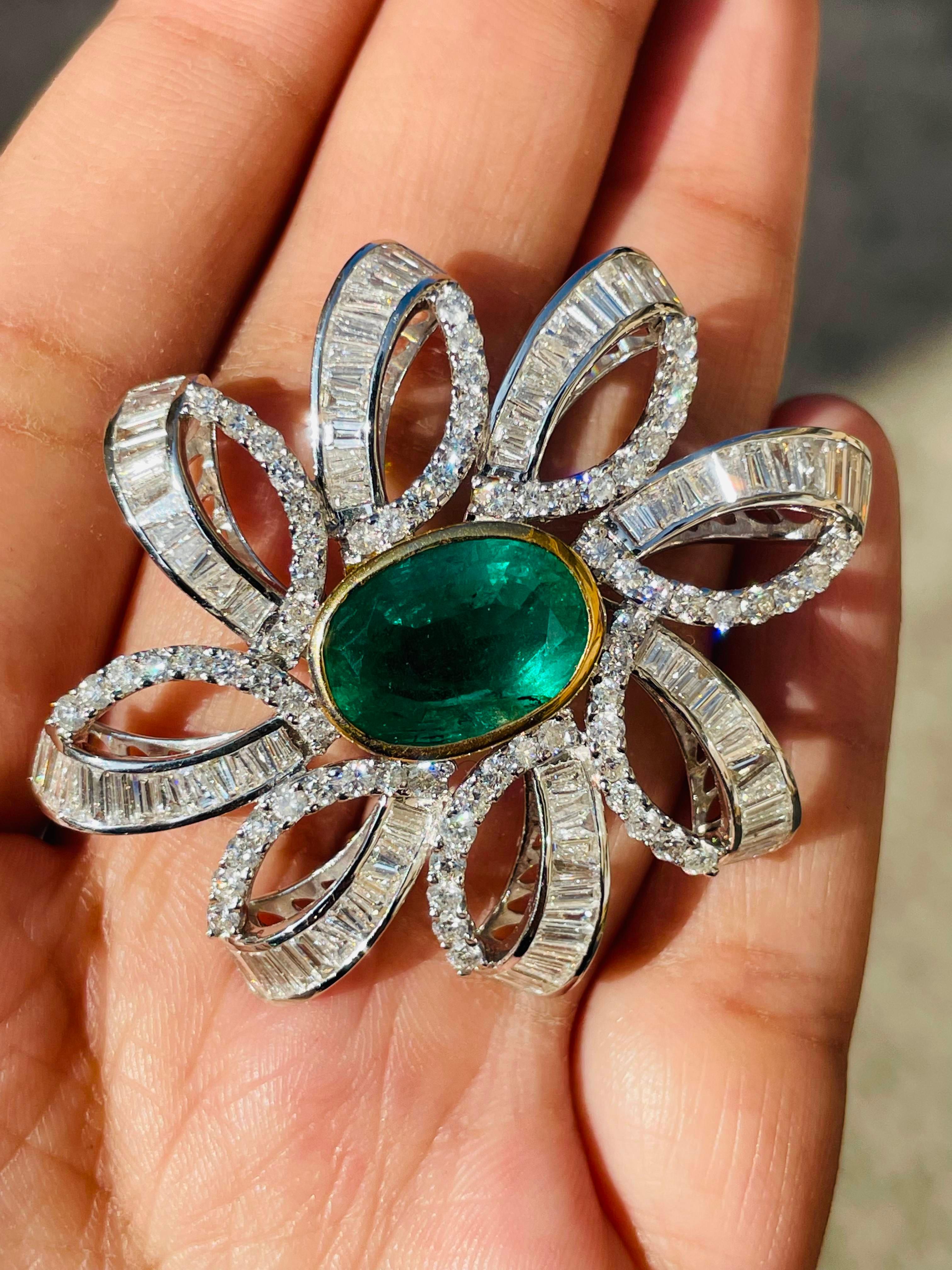 Emerald Diamond Blooming Floral Brooch Made in 18K Gold which is a fusion of surrealism and pop-art, designed to make a bold statement. Crafted with love and attention to detail, this features 7.5 carats of emerald which makes you stand out of the