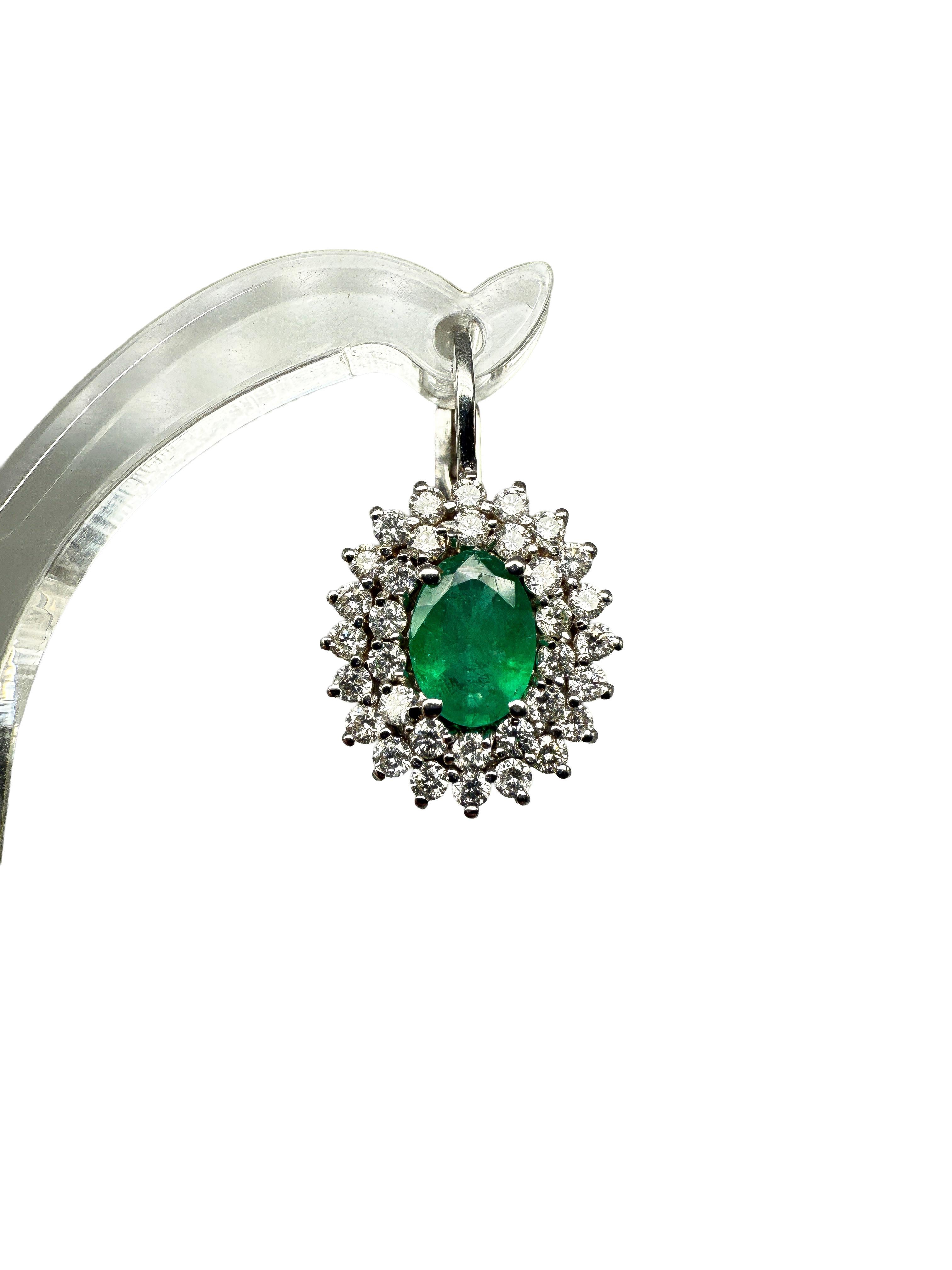 Exclusive Pendant & Earring Set – 18K White Gold with Emeralds and Diamonds

A true treasure for discerning jewelry lovers: This exquisite set, consisting of a pendant and matching earrings, pairs premium 18K white gold with naturally faceted