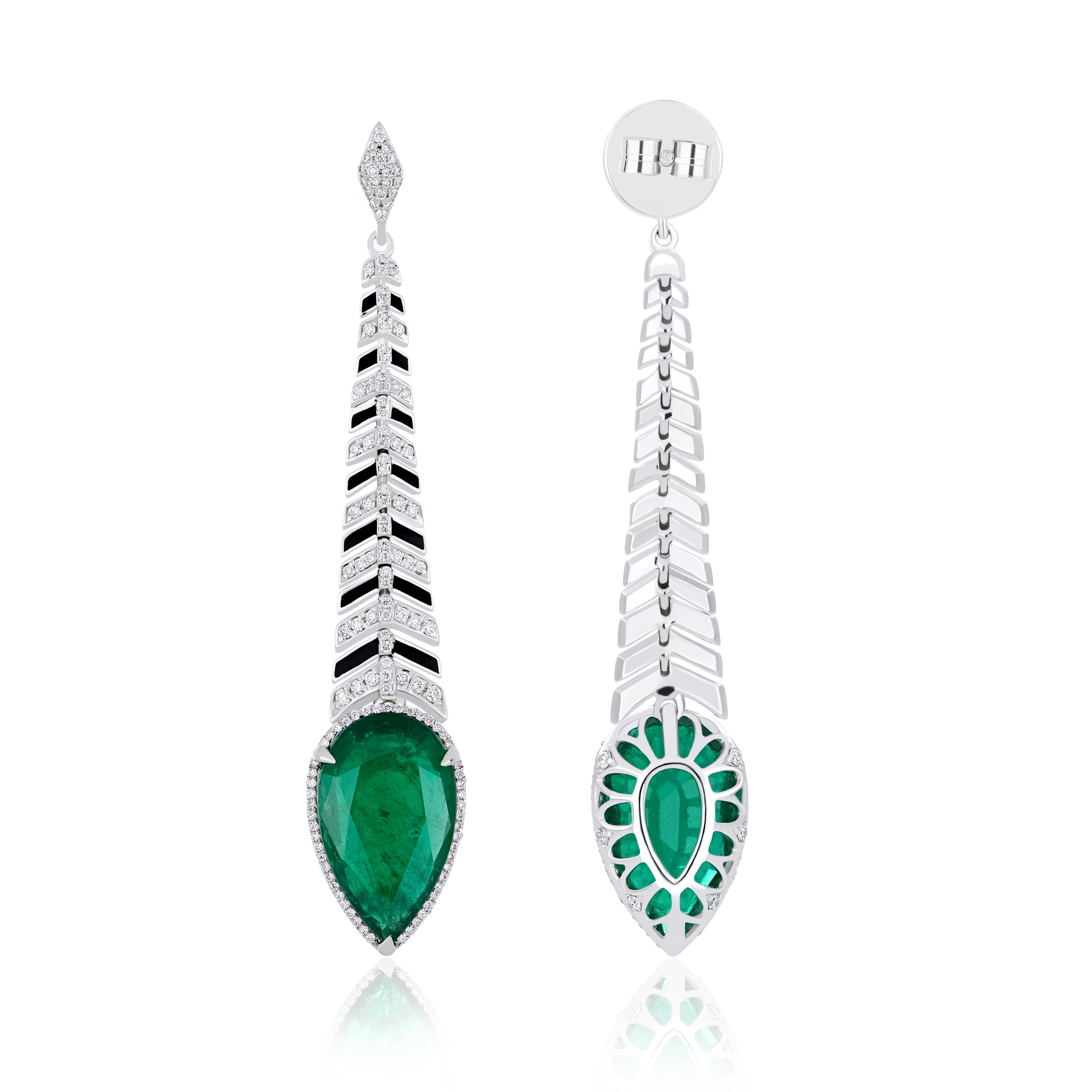 Elegant and Exquisitely Detailed 18 Karat White Gold Earring. Set with Pear Shape Emerald with approx. 9.1 Cts, and micro pave set Diamond with approx.  0.85 Cts, to further enhance the beauty contrasting Black Color Enamel is used to bring out the