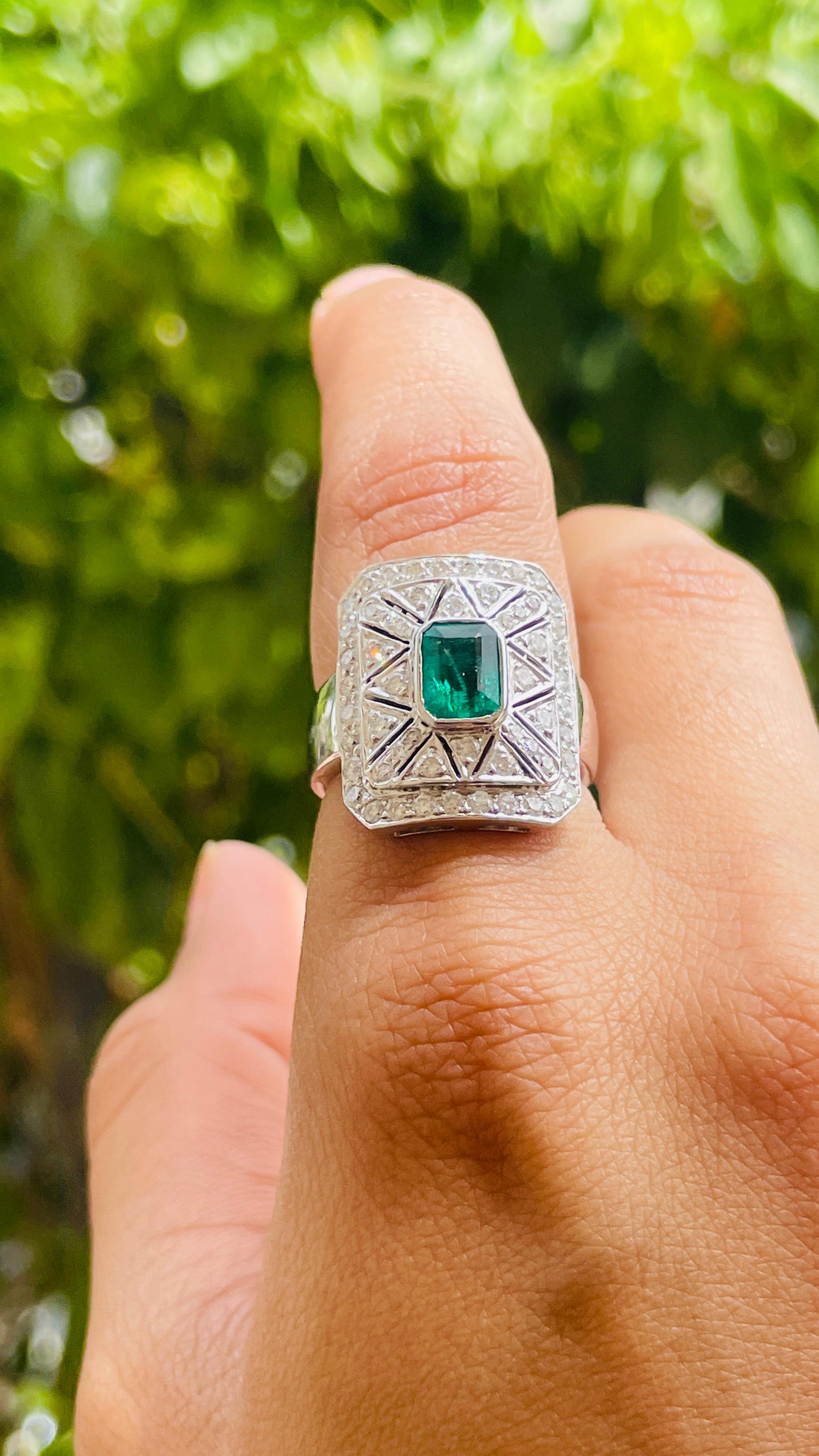 For Sale:  18K White Gold Emerald and Diamond Wedding Ring 12