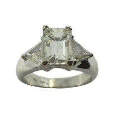 18K White Gold Emerald and Trillion Cut Diamond Three Stone Ring