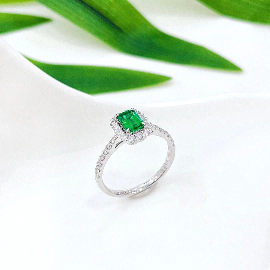 Modern 18K White Gold Emerald & Baguette Diamond Ring For Sale