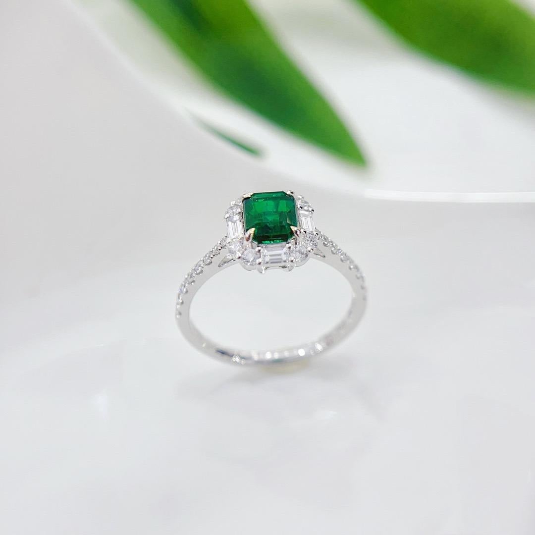 Modern 18K White Gold Emerald & Baguette Diamond Ring For Sale