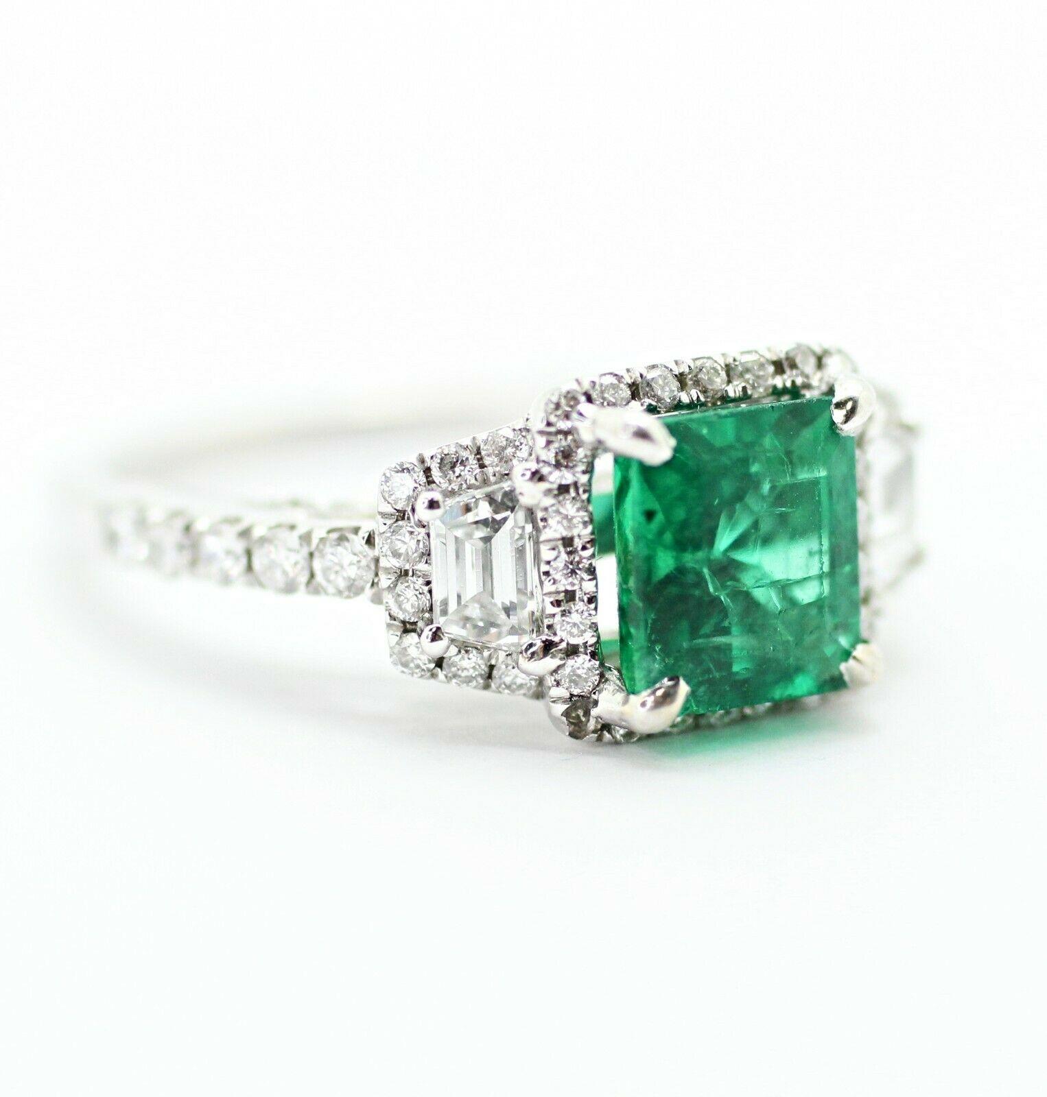  Specifications:
    main stone: RECTANGLE EMERALD APPROX 1.27CARAT
    DIAMONDS:  EMERALD/ROUND DIAM APPRX 0.95CTW
    carat total weight: APPROX 2.22CTW
    color: G/GREEN
    clarity: SI1
    brand: NONE
    metal: 18K WHITE GOLD
    type: RING
 