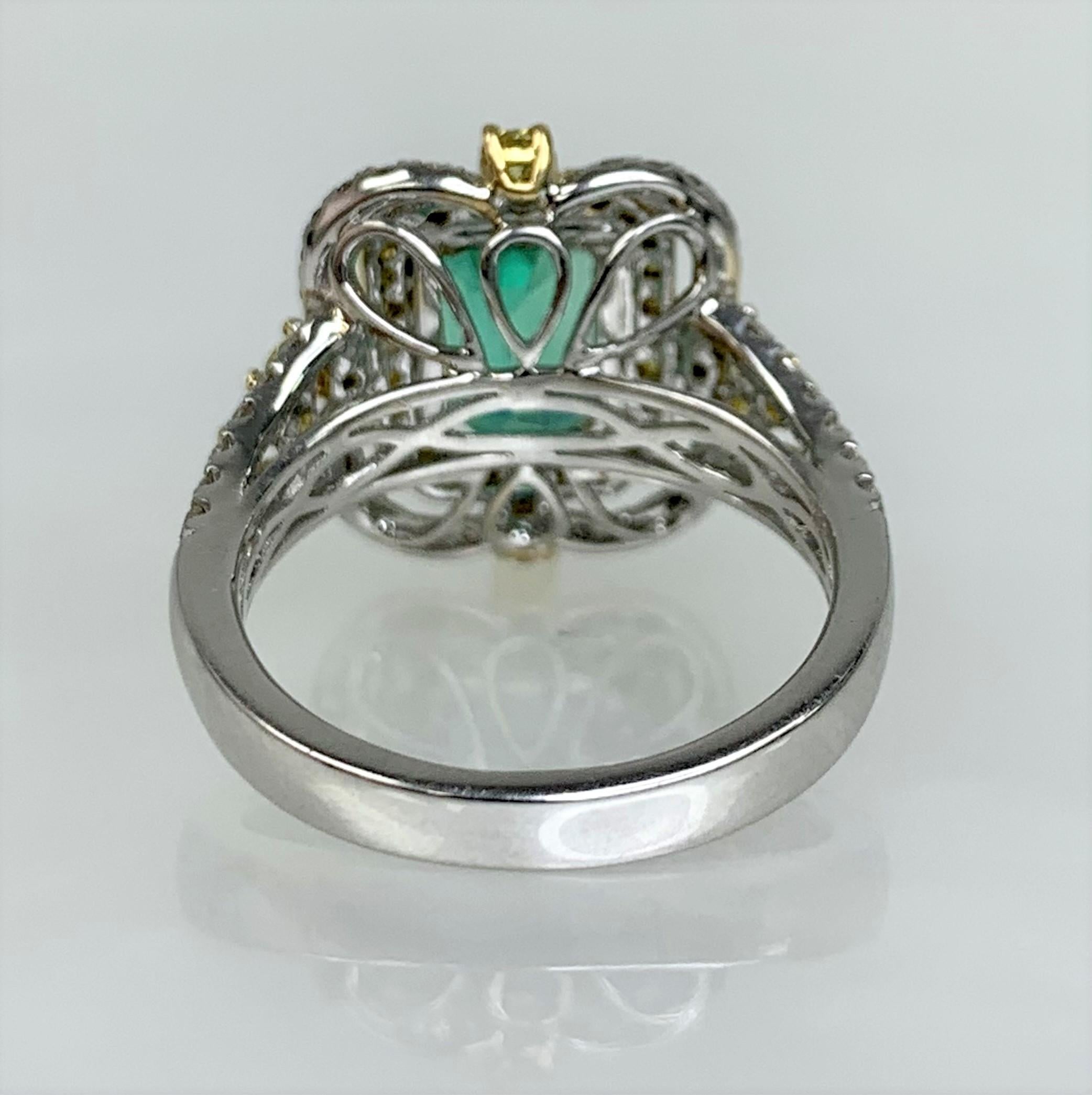 Men's 18K White Gold Emerald Cut Emerald White and Yellow Diamond Ring For Sale