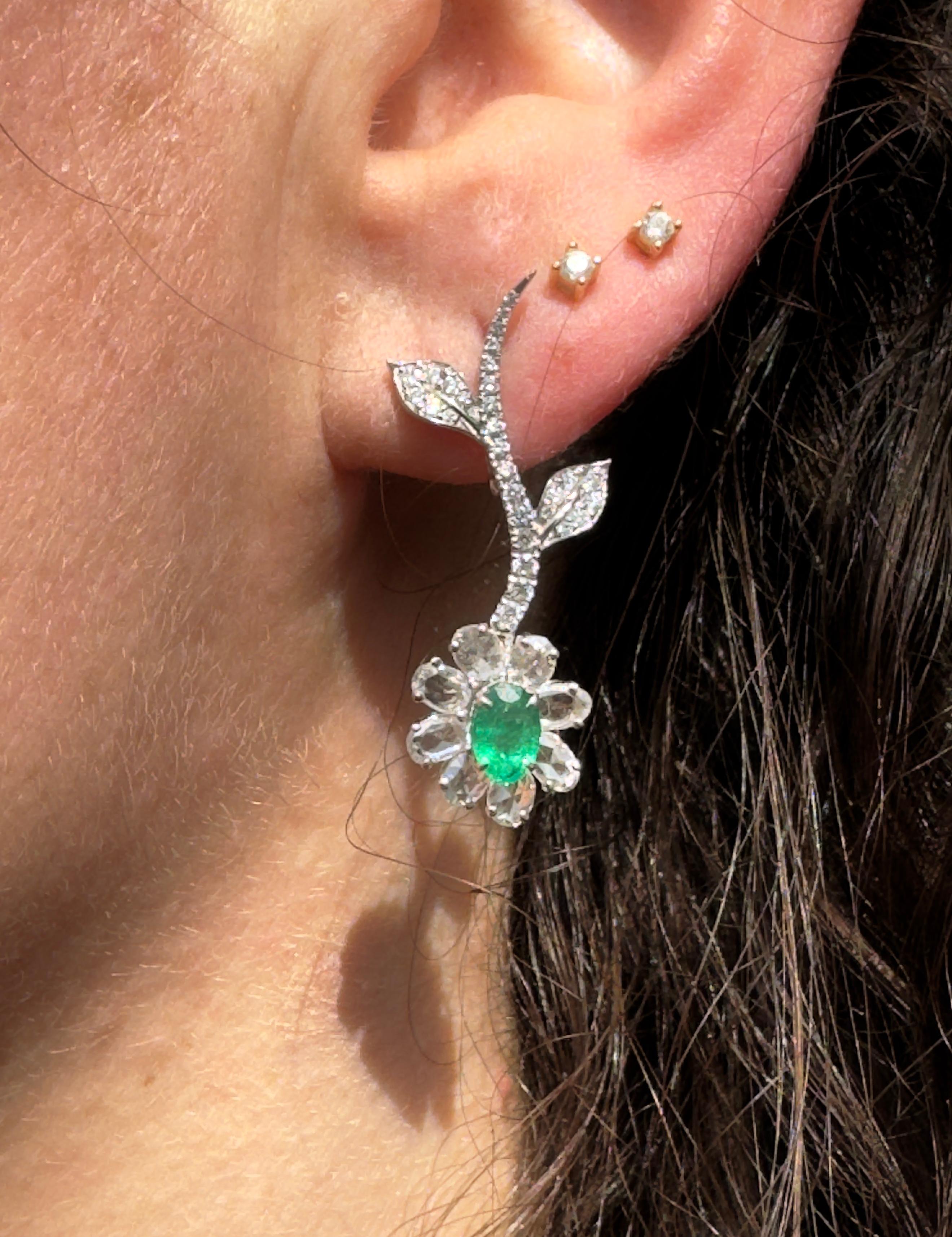 18K White Gold Emerald Diamond Dongle Earrings 
Handcrafted beautiful Colombian Emerald about 0.89 Carat, natural VS quality oval diamond about 1.66 Carat mounted in 18K white gold. About 1.25 inch long total weight about 5.7 grams.