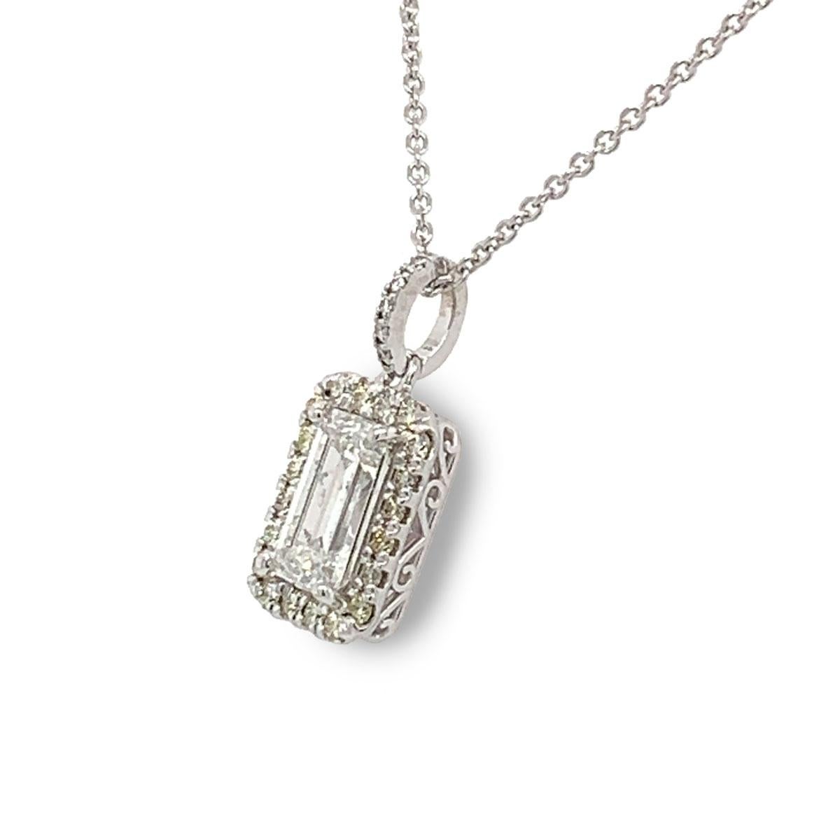 These extraordinary 18k White gold pendant features a 1.63 carat  an Emerald Cut Diamond G in color and I1 in clarity GIA certified. The diamond is framed in a halo of brilliant diamonds in a 0.32 carat total weight. This pendant is ideal for