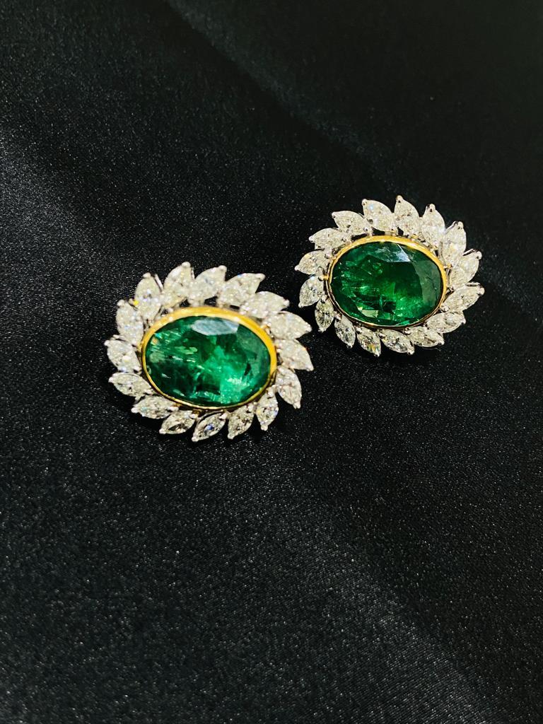 Statement Emerald Diamond Stud Earrings in 18K Gold to make a statement with your look. You shall need statement Stud earrings to make a statement with your look. These earrings create a sparkling, luxurious look featuring oval cut emerald.
Emerald
