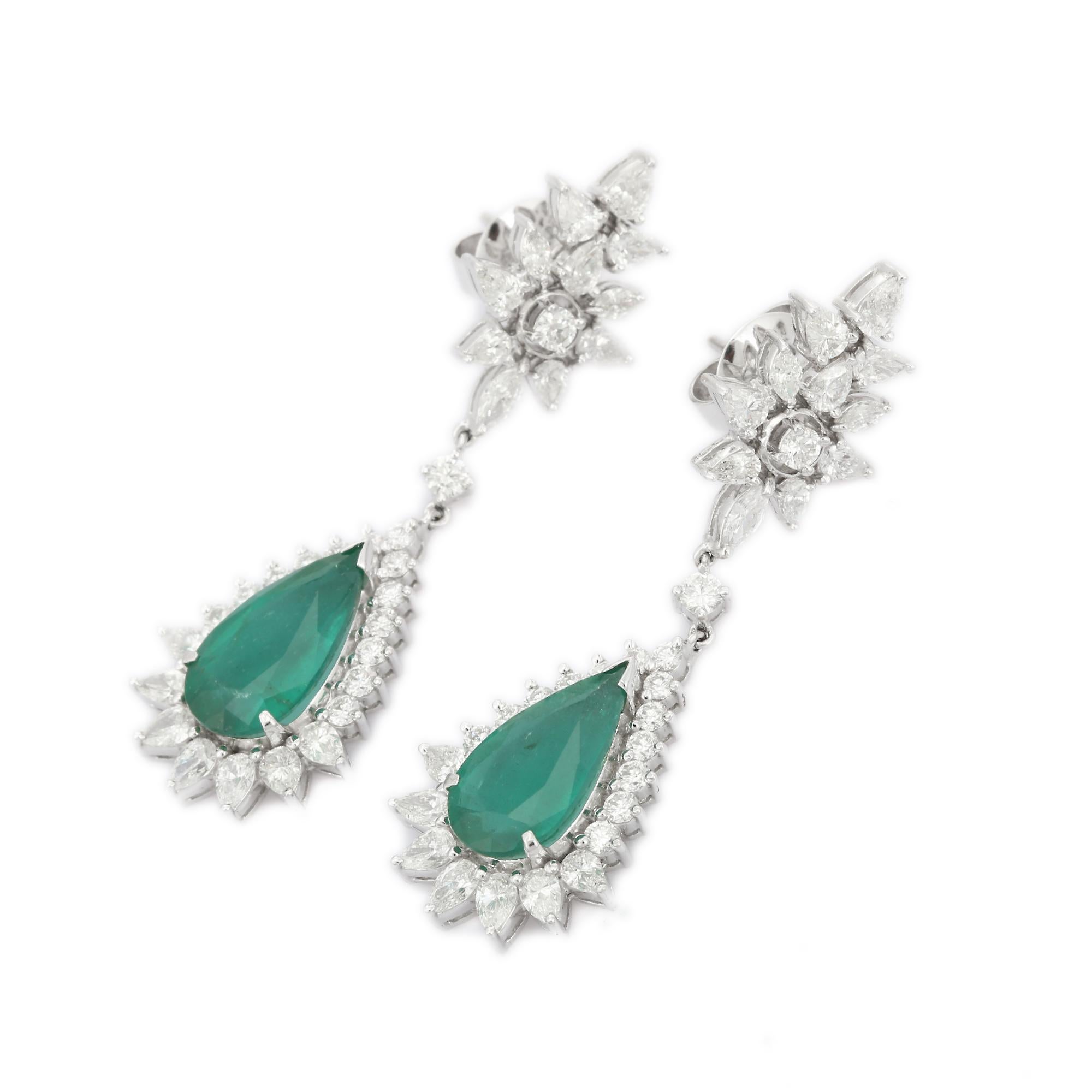 Etincelle Diamond and Pear Emerald Dangle Earrings in 18K Gold to make a statement with your look. You shall need statement dangle earrings to make a statement with your look. These earrings create a sparkling, luxurious look featuring pear cut