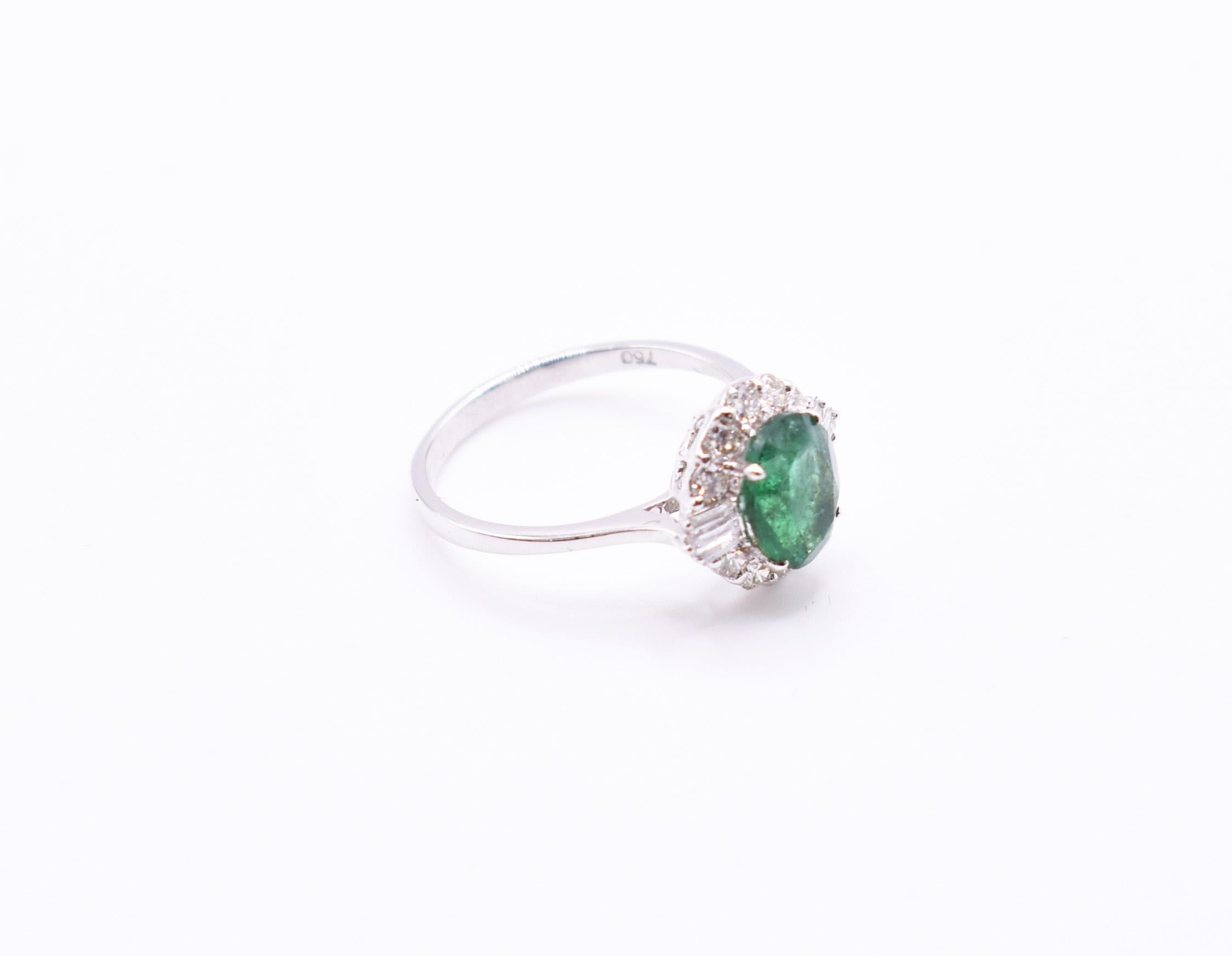 A splendid 18k white gold emerald & diamond ring. A good quality emerald, of Zambian origin, is 1.86ct, while the diamonds total 0.63ct. VS/SU/G/H Colour.

Ring Size UK: O US: 7

RRP: £3,995