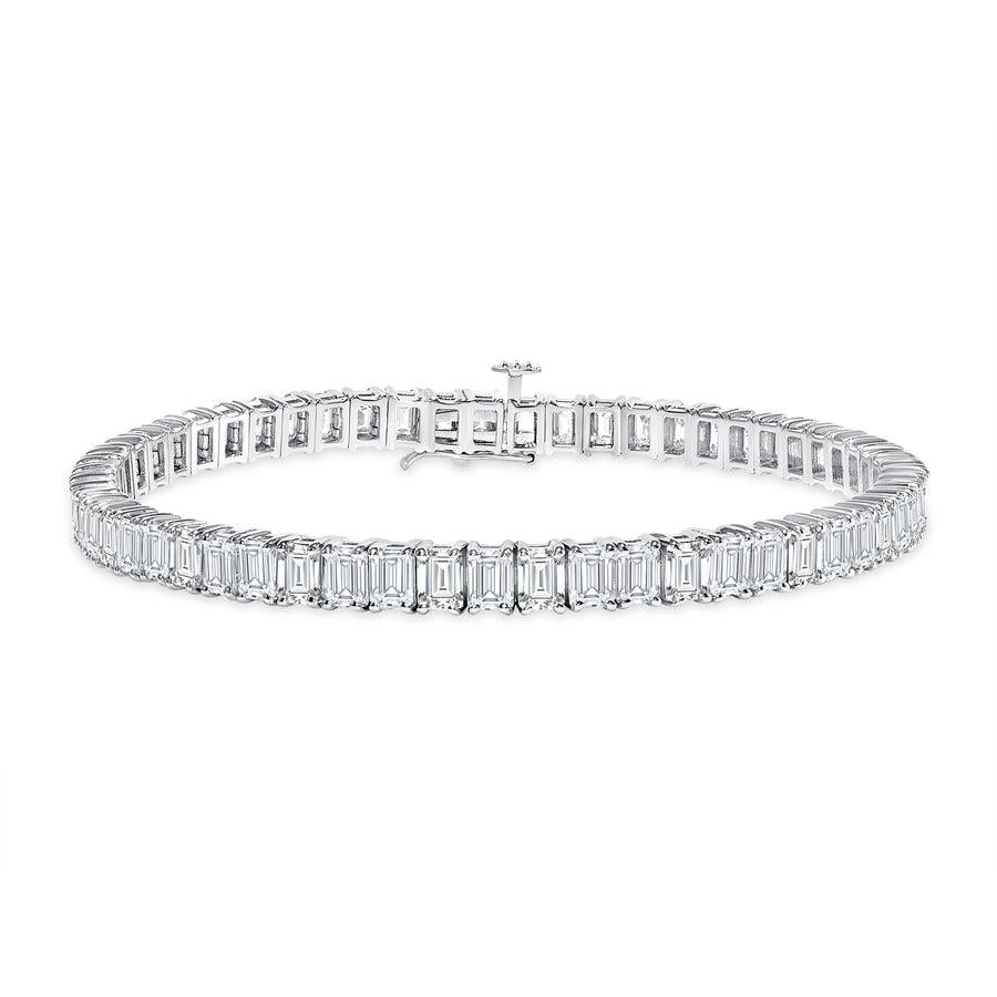 This eye catching emerald-cut diamond tennis bracelet gives the wrist a glamorous sparkle. 

Metal: 18k Gold
Diamond Cut: Emerald 
Diamond Total Carat: 5 Carat approx. 
Diamond Clarity: Vvs-Vs
Diamond Color: F-G 
Color: White Gold
Bracelet Length: 7