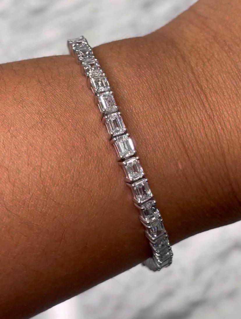This eye catching emerald-cut diamond tennis bracelet gives the wrist a glamorous sparkle. 

Metal: 18k Gold
Diamond Cut: Emerald 
Diamond Total Carat: 10 Carat 
Diamond Clarity: Vvs-Vs
Diamond Color: F-G 
Color: White Gold
Bracelet Length: 7 Inches