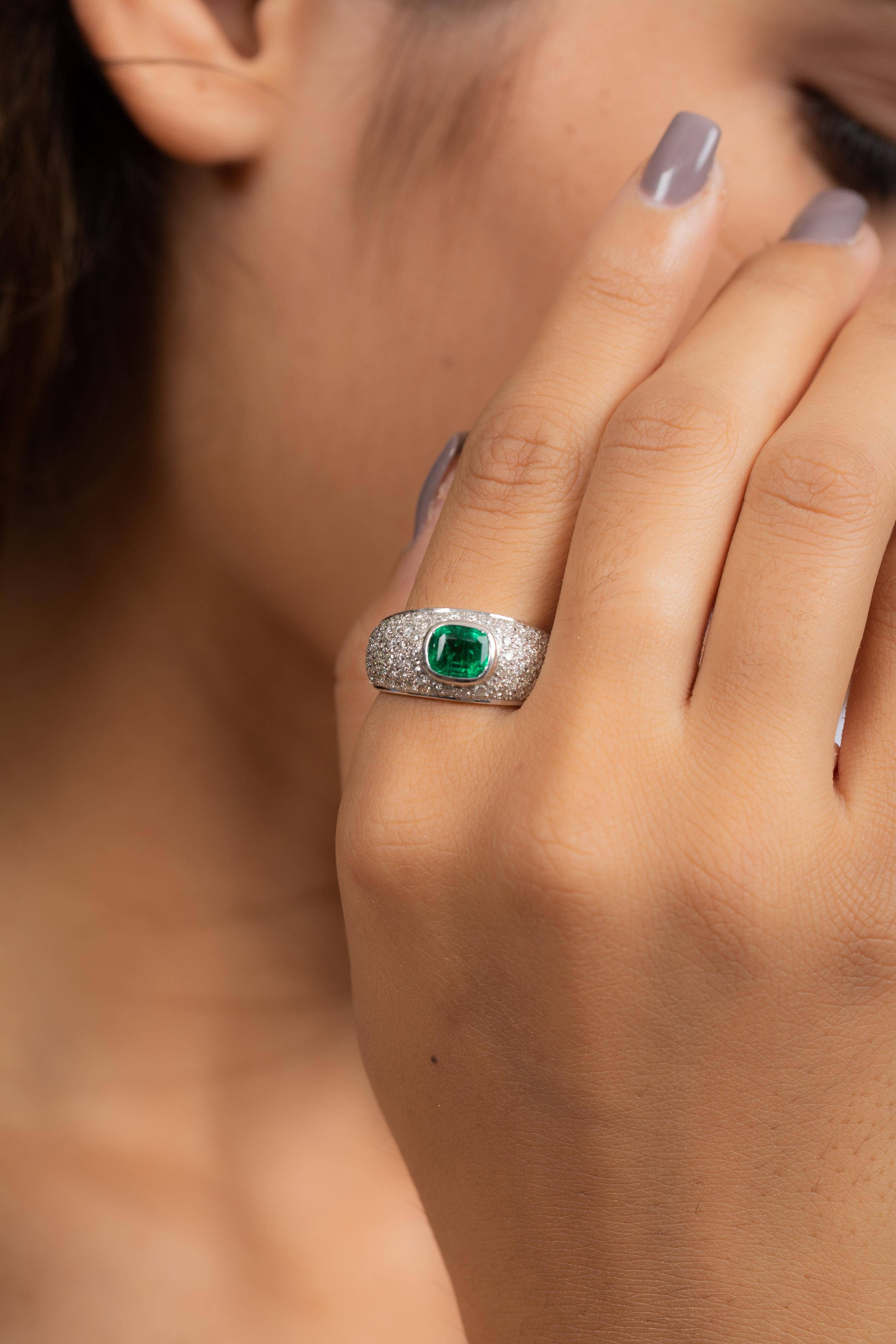 For Sale:  18K White Gold Emerald Ring Along with Clustered Diamonds  8