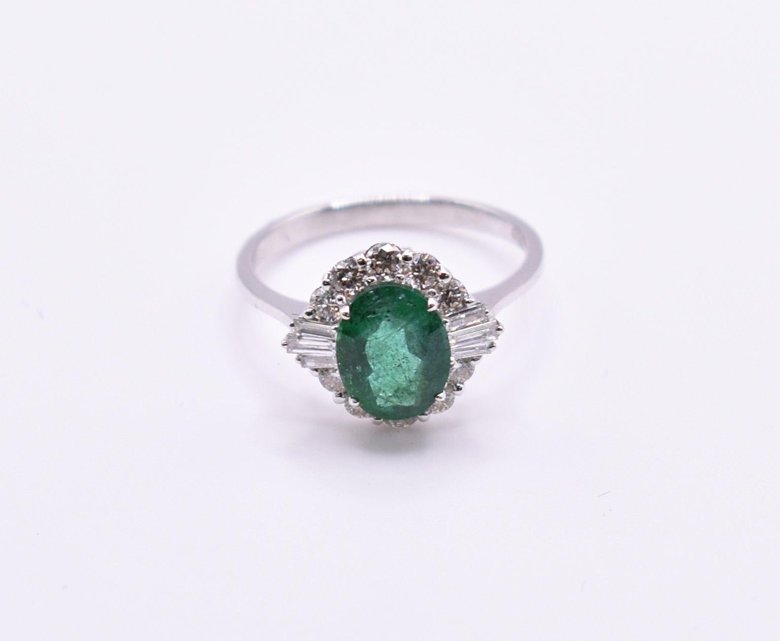 A splendid 18k white gold emerald & diamond ring. A good quality emerald, of Zambian origin, is 1.86ct, while the diamonds total 0.63ct. VS/SU/G/H Colour.

Ring Size UK: O US: 7

RRP: £3,995