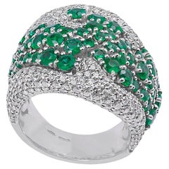 18k White Gold, Emeralds, and Diamonds Ring