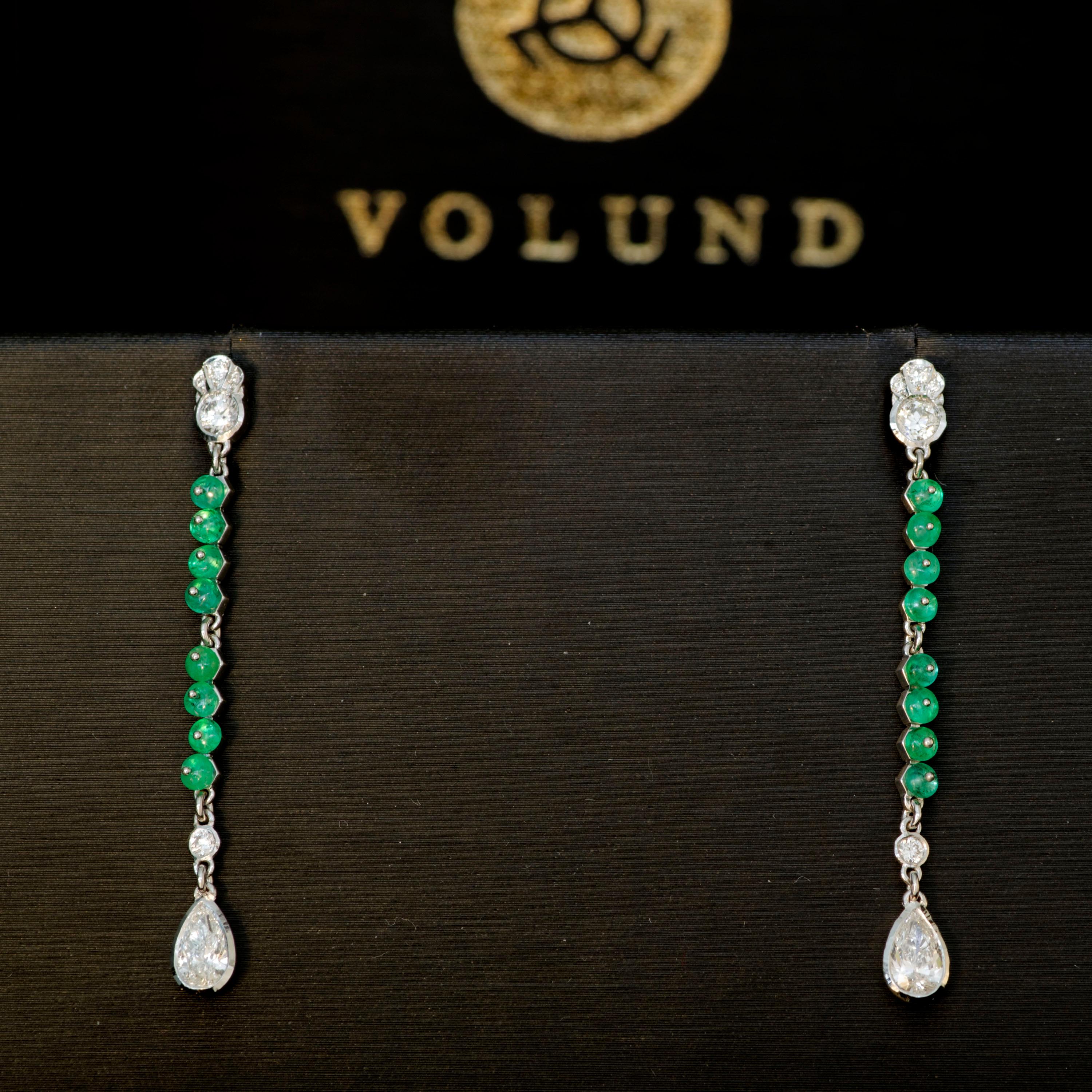 A delicate Art Deco Style suite of earrings and pendant in 18K white gold, emeralds (cabochon and beads) and diamonds. Refined creation by a high end designer.

Please note: this was a bespoke, unique creation. We can create another one for you