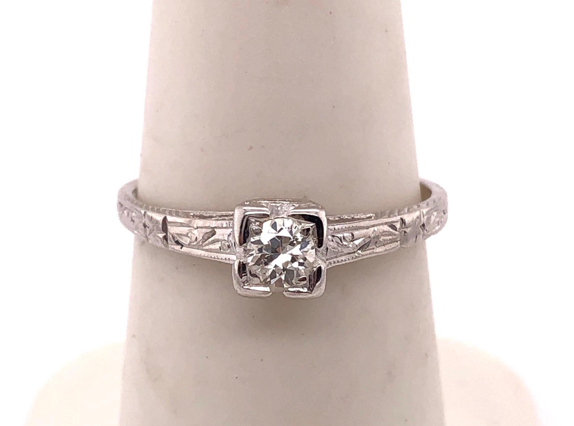 18K White Gold Engagement Ring/Bridal Ring 
0.25 Total Diamond Weight.
Size 6.5
2.00 grams total weight.