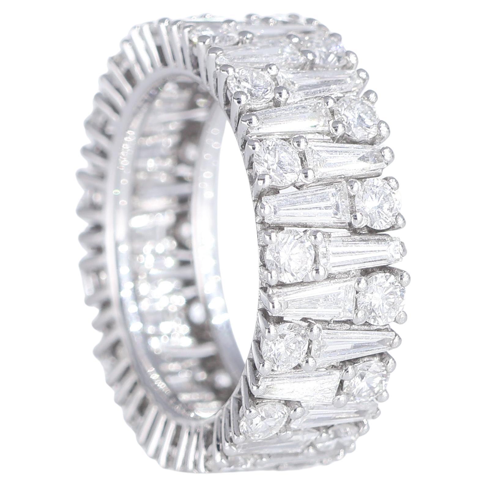 18K White Gold Eternity Ring with Brilliant, Trapezoid, and Round-Cut Diamonds For Sale