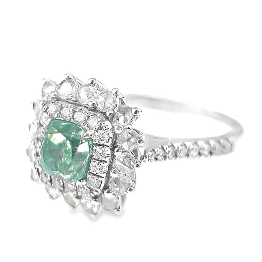 18K White Gold Fancy Green Diamond & Diamond Ring

1 Fancy Green Diamond - 0.70 CT
Diamonds - 0.66 CT
18K White Gold - 4.21 GM

Elevate your style with this captivating 18K white gold ring. The centerpiece is a stunning 0.70 carat fancy green