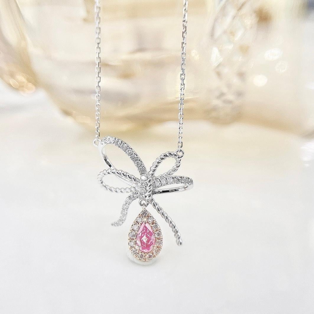 Modern 18K White Gold Fancy Pink Diamond Bow Design Pendant Necklace with Diamonds For Sale
