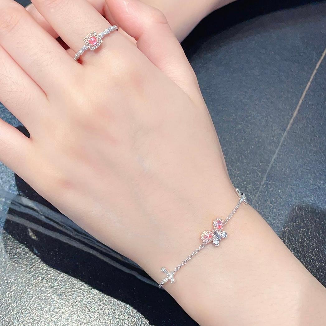 Pear Cut 18K White Gold Fancy Pink Diamond Butterfly Bracelet with Diamonds For Sale