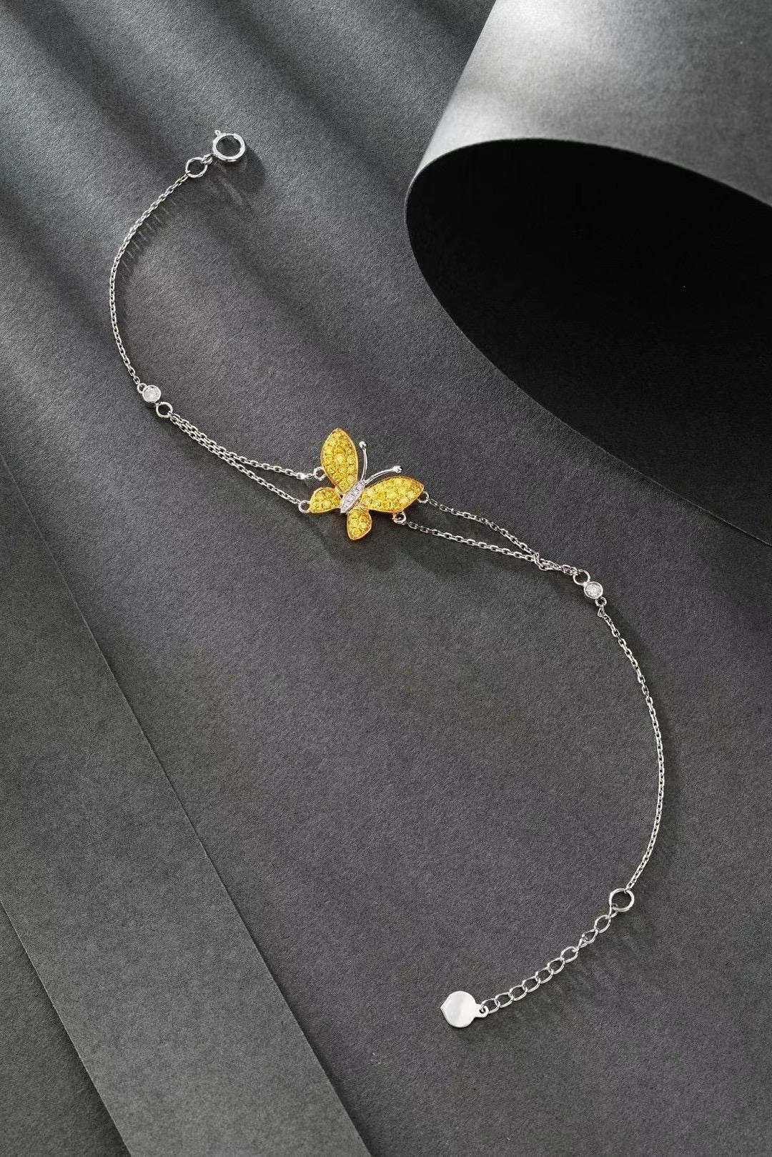 Modern 18K White Gold Fancy Yellow Diamond & Diamond Butterfly Bracelet For Sale