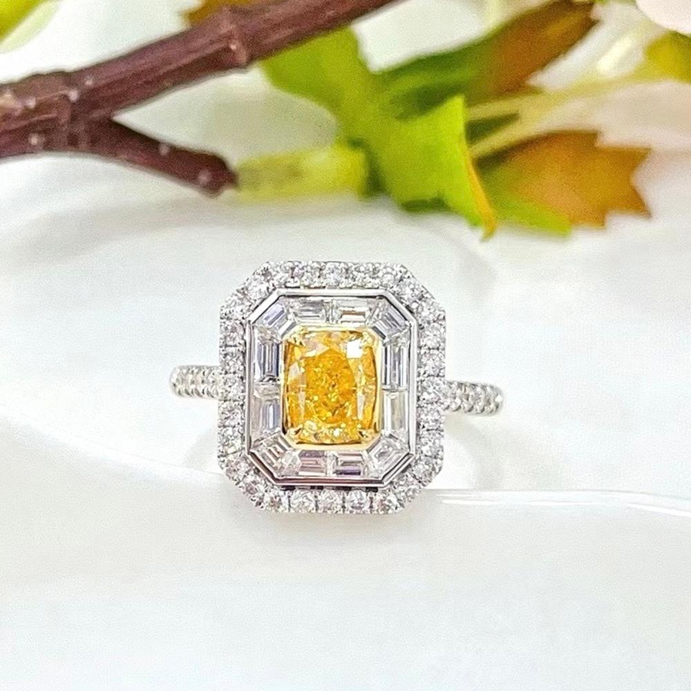 18K White Gold Fancy Yellow Diamond & Diamond Cocktail Ring

1 Fancy Yellow Diamond - 1.01 CT
Diamonds - 0.97 CT
Total Weight - 4.95 GM