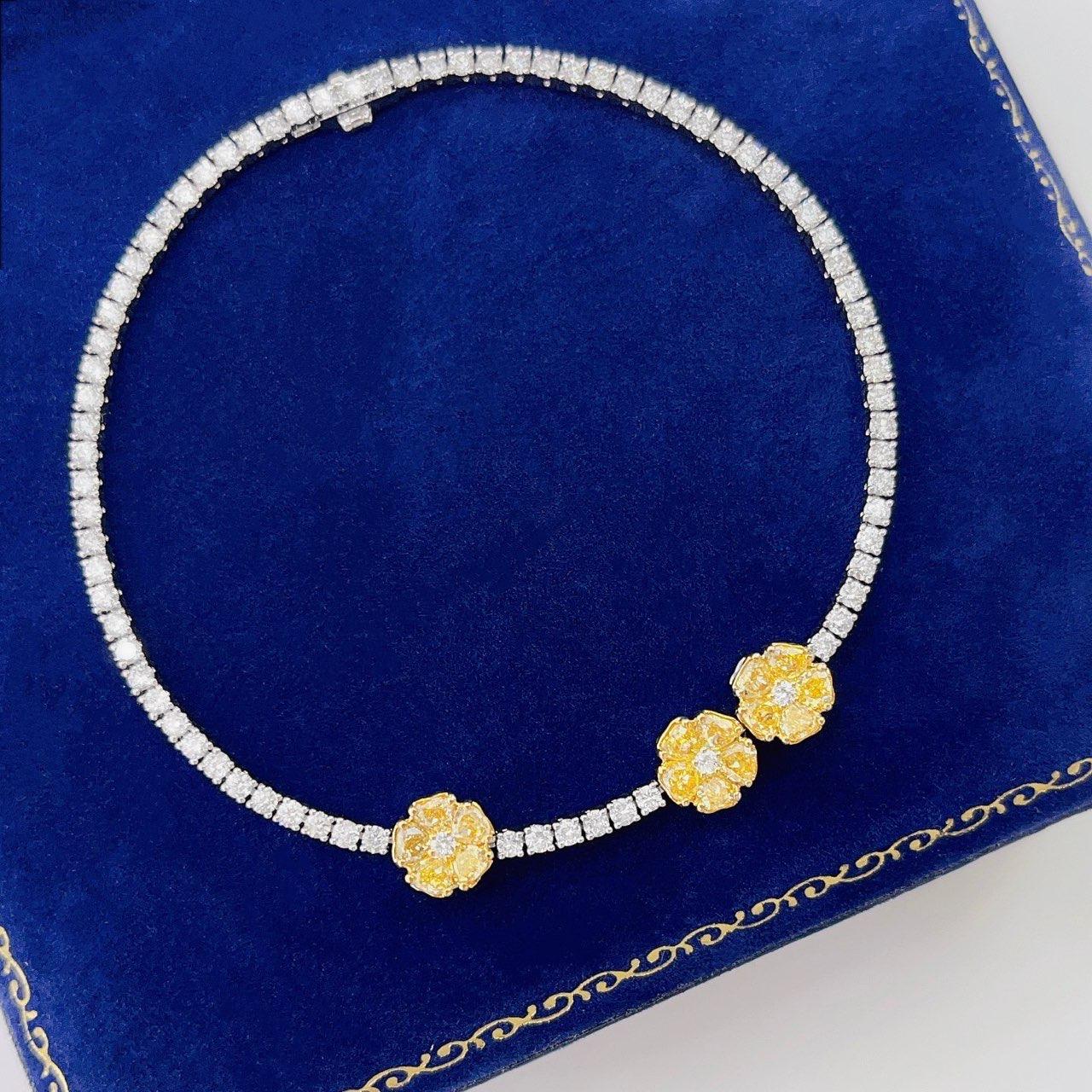 Pear Cut 18K White Gold Fancy Yellow Diamond & Diamond Flower Bracelet For Sale