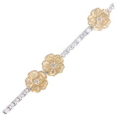 Bracelet fleur en or blanc 18 carats avec diamants jaunes fantaisie et diamants