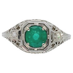 Antique 18K white gold Filigree Deco .55ct Emerald Ring