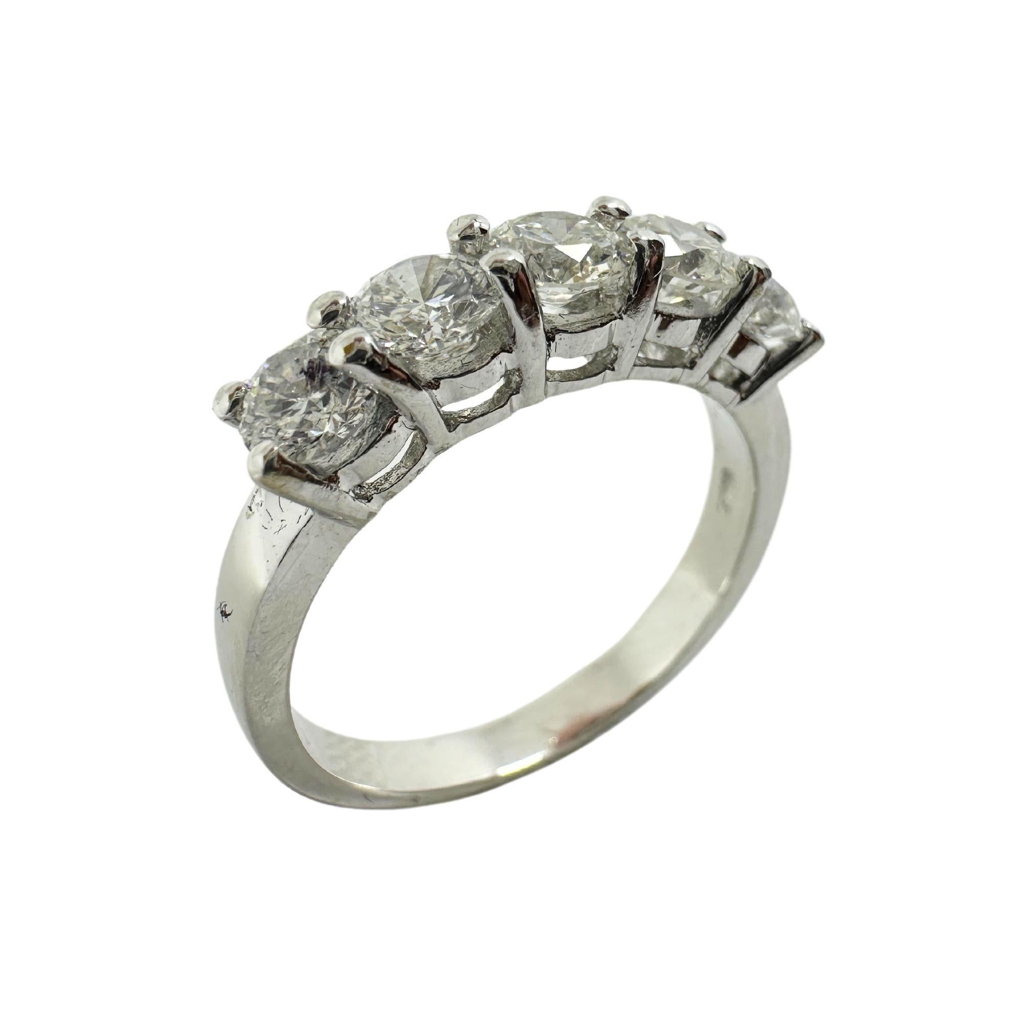 18K White Gold Five Stone Diamond Band 
Condition: In good condition with some minor surface wear consistent with age.
Ring size: 6.50
Markings: 