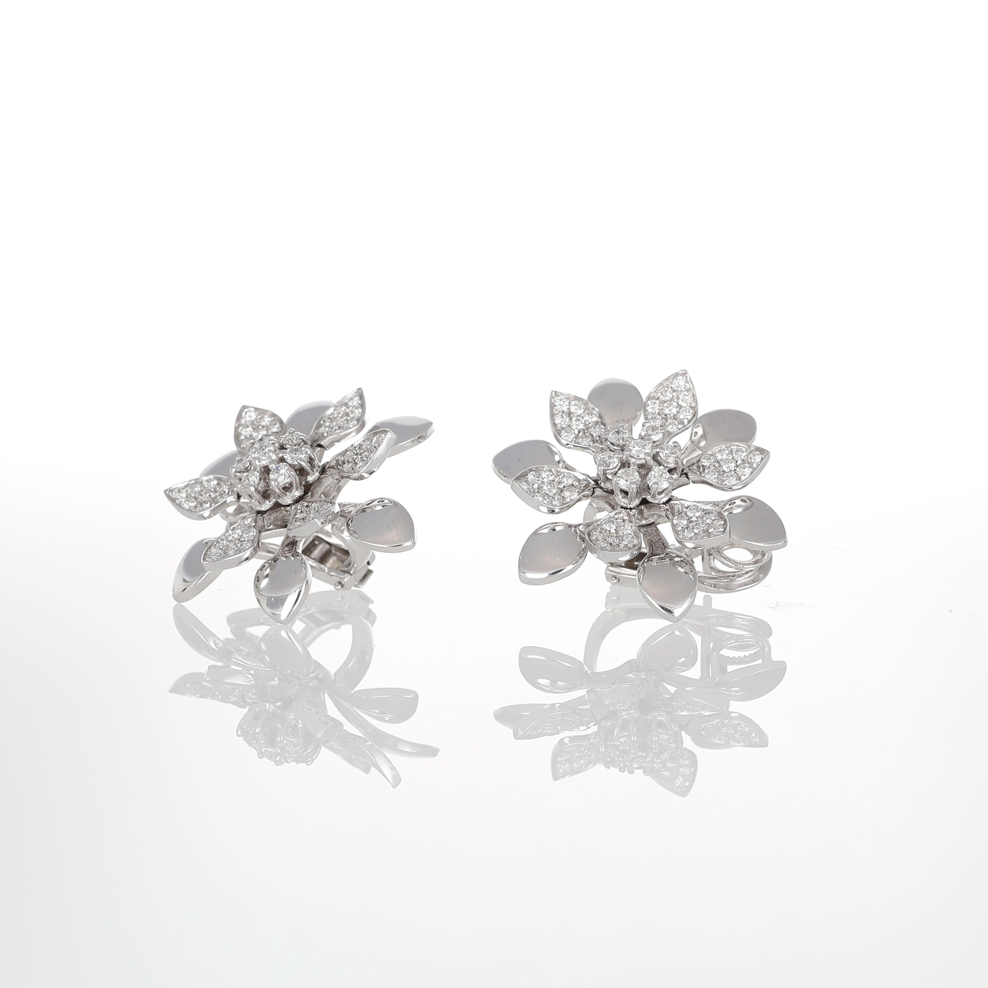 Elegant and sculptural, these floral earrings in 18K white gold feature articulated petals that create a dynamic and lifelike effect. Brilliant-cut white diamonds, totaling 2.62 carats, are set across the petals, enhancing the design’s luminosity.
