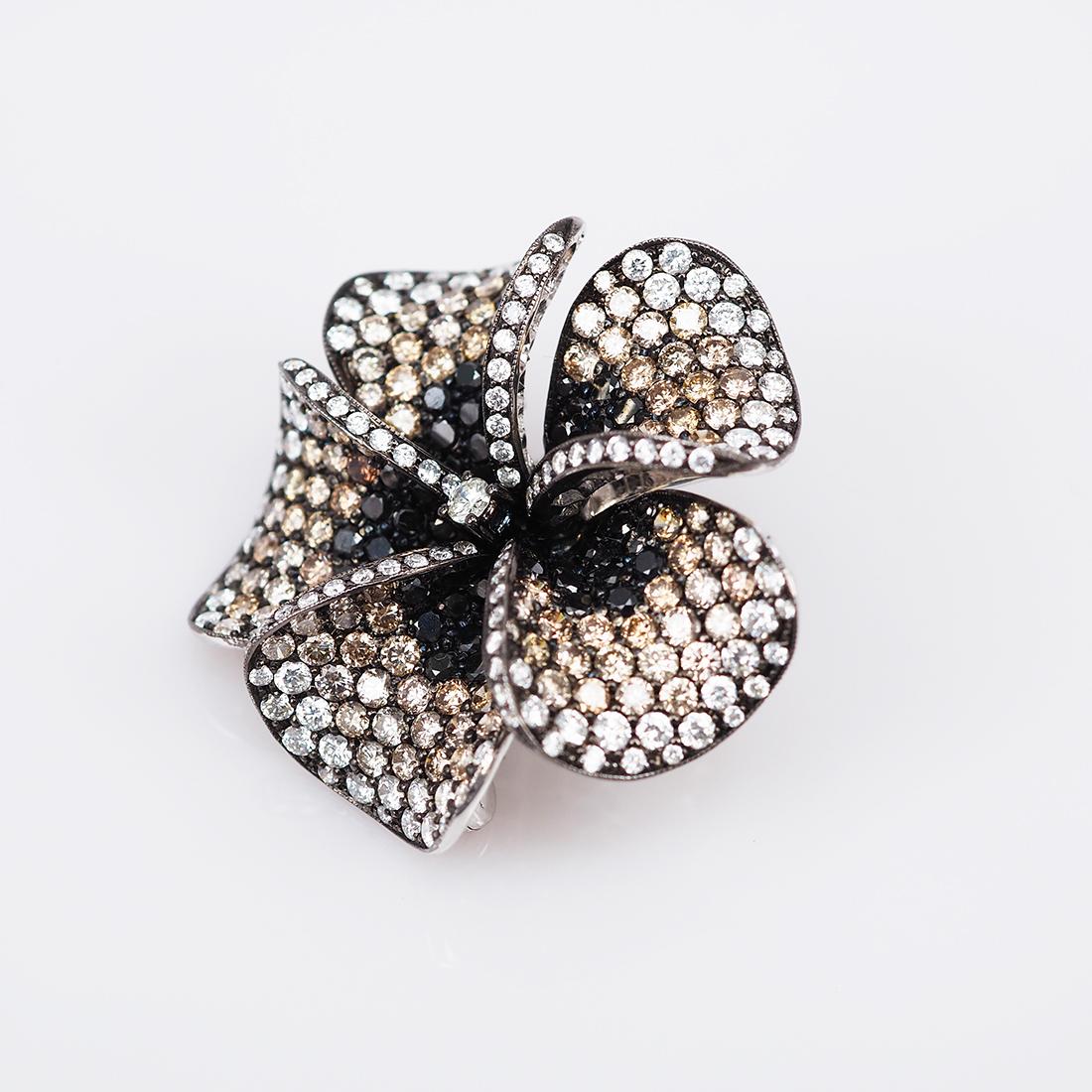 Diamond brooch and pendant .You can use as 2 ways.We design as the motive of nice leelavadee flower.We shade color of diamond form black,brown and white diamond .To make it look soft and nice.Diamond use 8.09 ct the setting made in 18k White gold.It