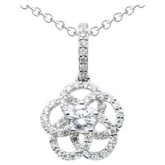 Pendentif fleur en or blanc 18K avec diamant