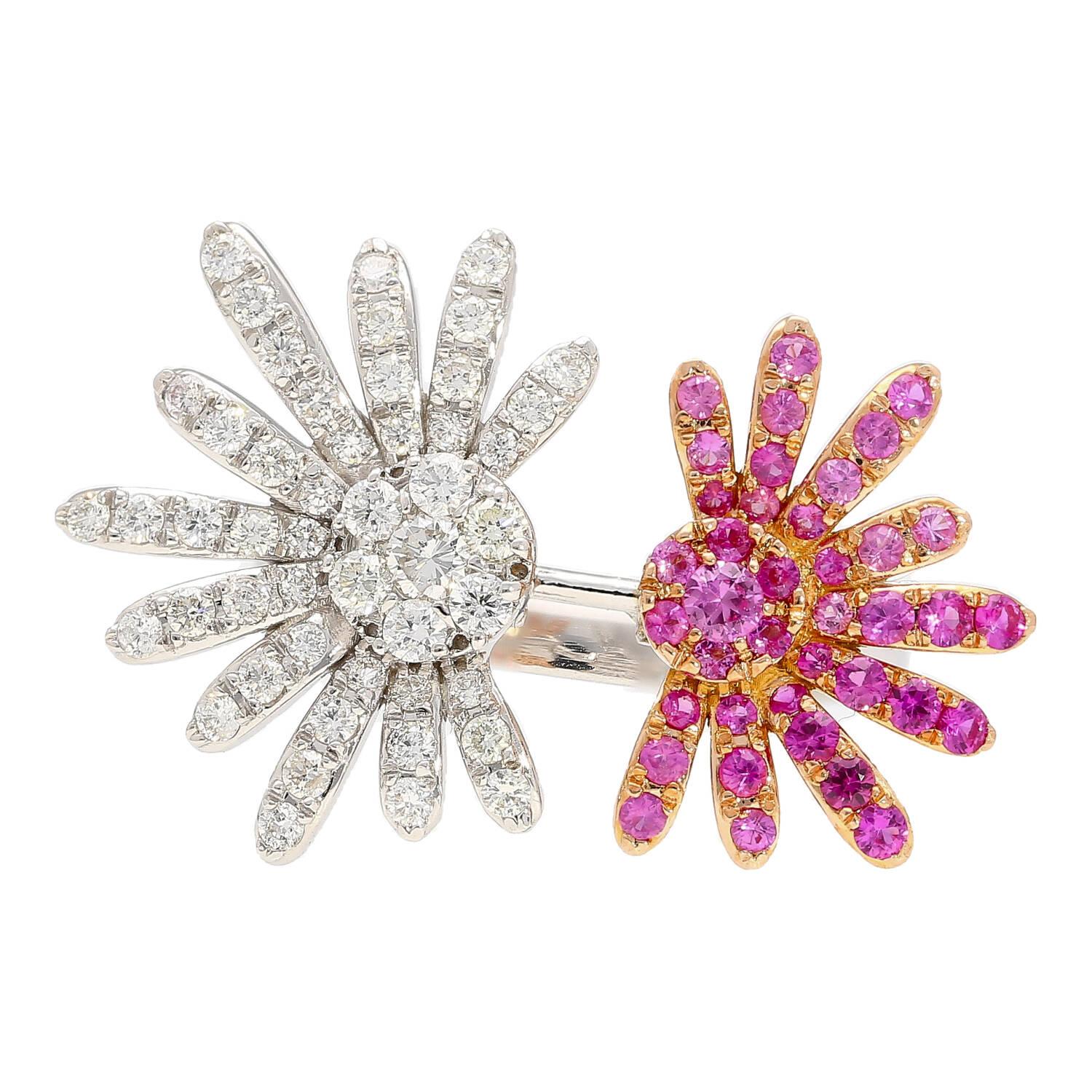 This exotic ring features both white diamonds and pink sapphires to create a truly eye catching display of design. The 49 round cut diamonds weigh 0.66 carats, and the 39 pink sapphires weigh 0.59 carats. This ring is set in 18k white gold, and all
