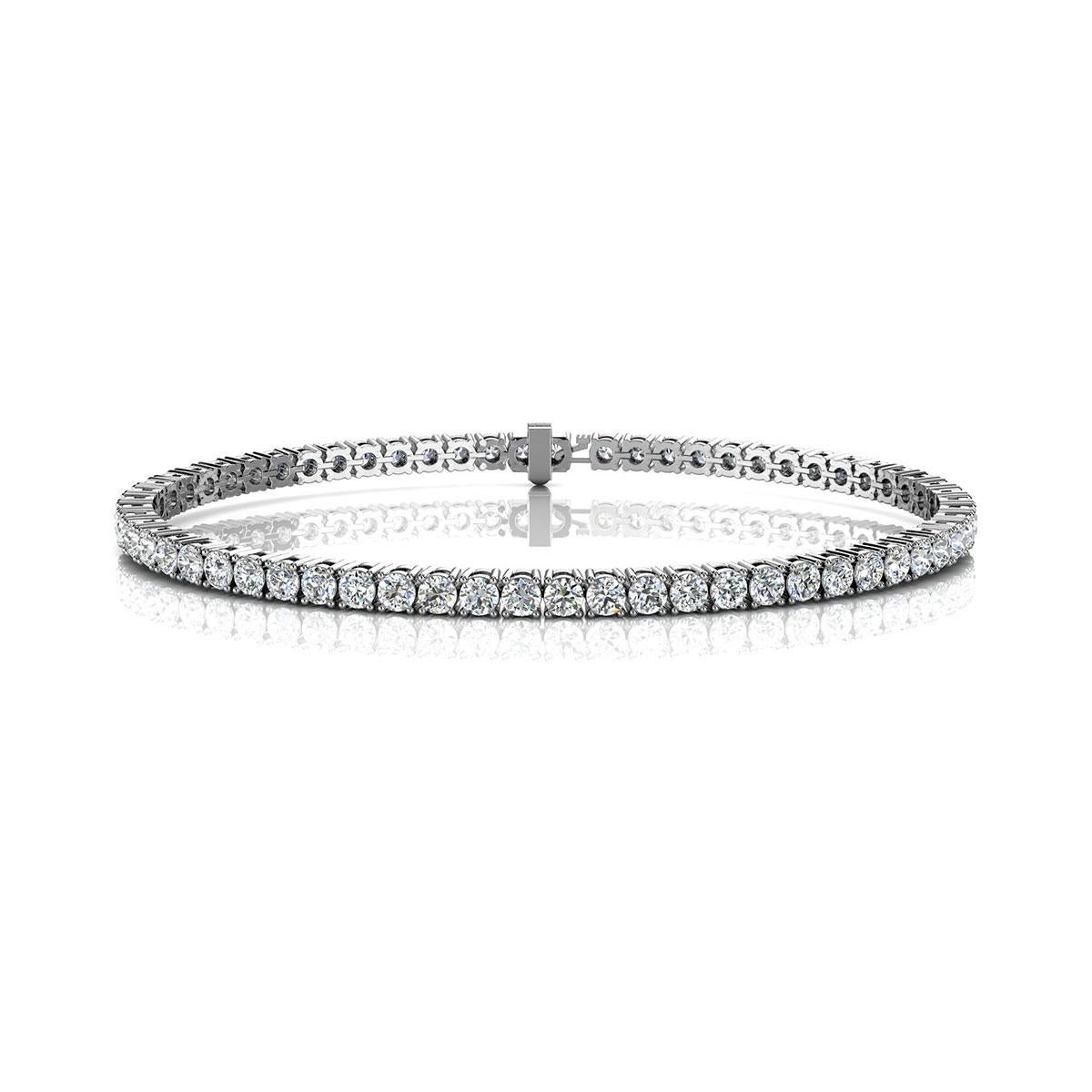 A timeless four prongs diamonds tennis bracelet. Experience the Difference!

Product details: 

Center Gemstone Type: NATURAL DIAMOND
Center Gemstone Color: WHITE
Center Gemstone Shape: ROUND
Center Diamond Carat Weight: 3
Metal: 18K White