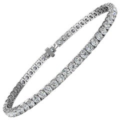 Bracelet tennis à quatre griffes en or blanc 18 carats avec diamants 8 carats poids total