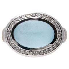 18k White Gold Frosted Cabachon Blue Topaz And Diamond Halo Ring