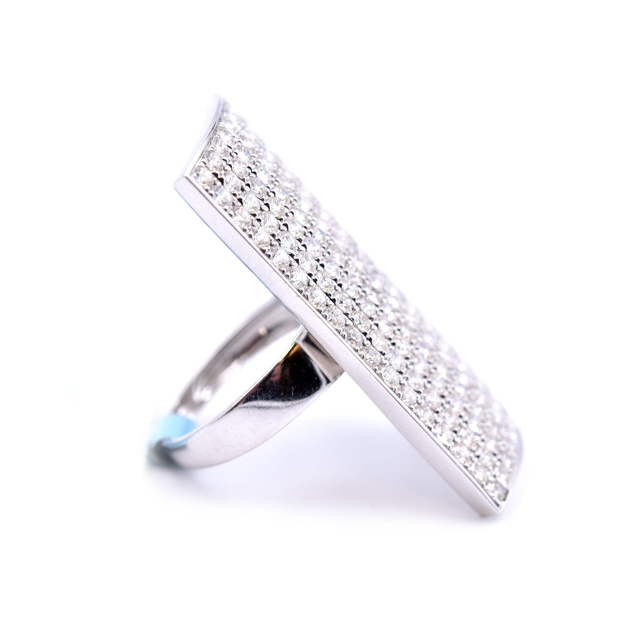 Designer: custom design
Material: 18k white gold
Diamonds: 153 round brilliant cut = 3.89cttw
Color: G
Clarity: VS
Size: 7 (please allow two additional shipping days for sizing requests)
Dimensions: ring top is 37mm by 19mm
Weight: 10.48 grams	

