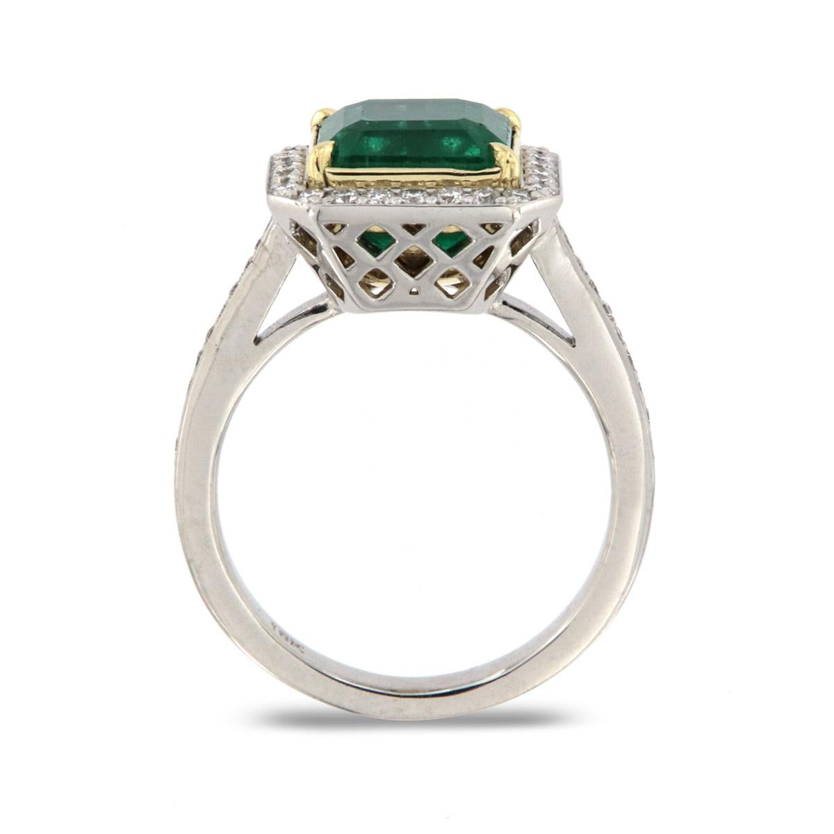From our signature Gemstones collection of exquisite red carpet pieces, this handcrafted 18k Two-Tone gold ring is centering a 3.56 Carat of top quality Ethiopian square green emerald in premium luster encircled by a halo of brilliant round