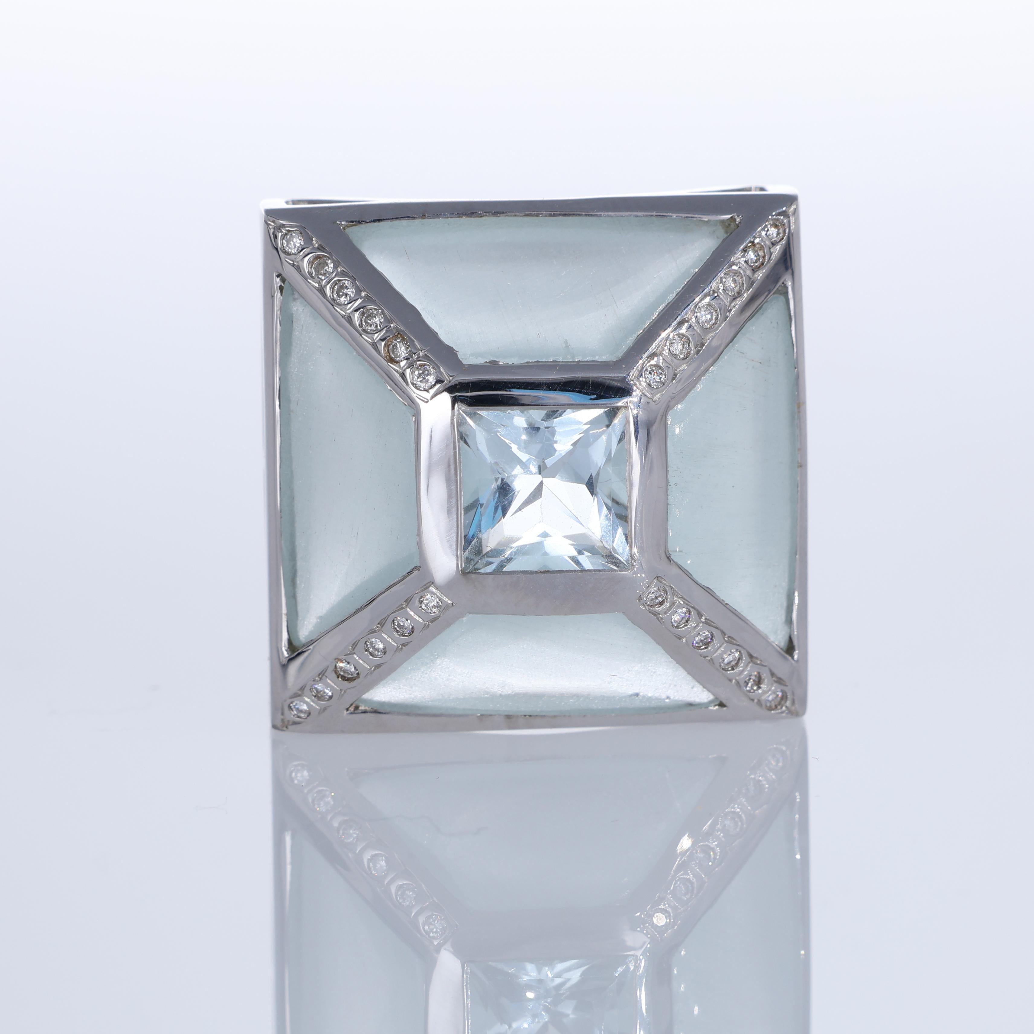 IMPORTANT NOTE:
✔ No additional costs will be added to this order.
✔ Shipping and customs duties are fully covered by us.
--------------------
A bold 18K white gold band ring with a striking geometric design, featuring a central faceted aquamarine